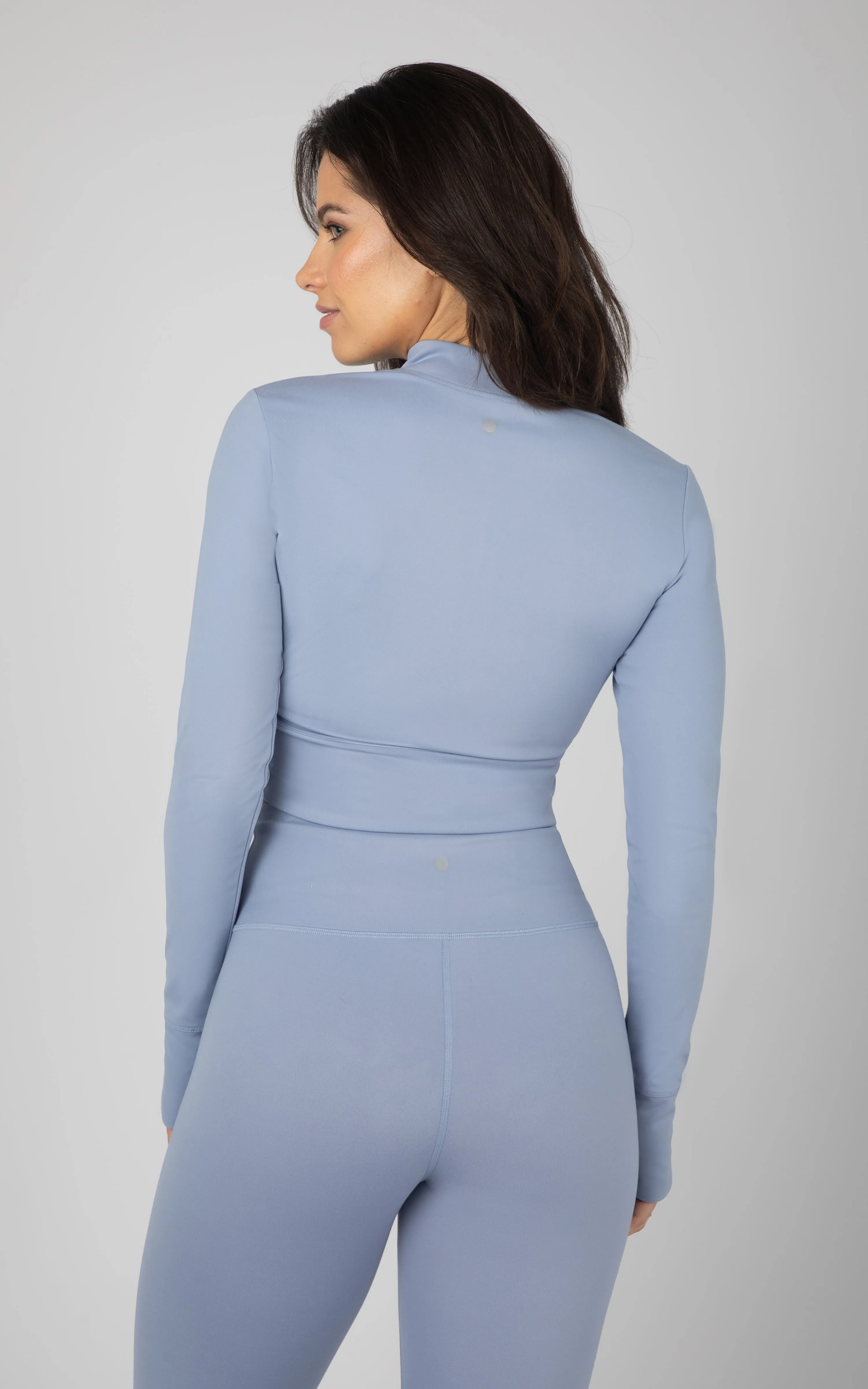 Lux Half Zip Crossover Hem Top